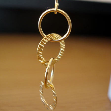 Boucles d'oreilles longues anneaux or jaune 750