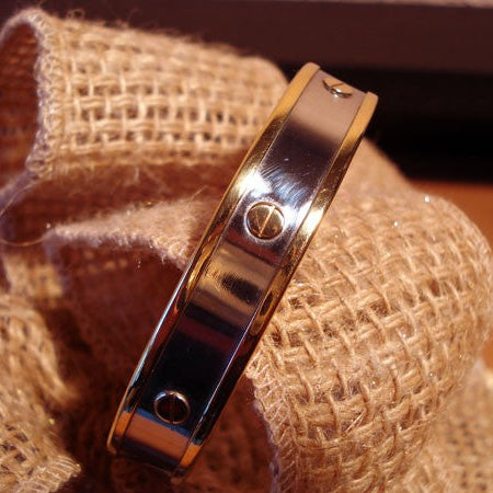 Bracelet jonc clous acier et or 750