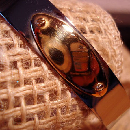 Bracelet  jonc ouvert acier et or 750