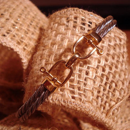 Bracelet Etrier câble acier et or 750 mixte