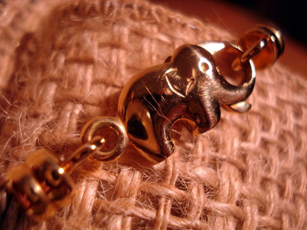 Bracelet mixte Eléphant câble acier et or 750