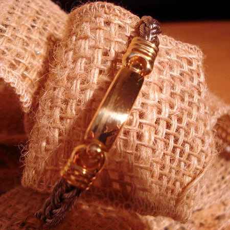 Bracelet Identité câble tressé acier et or 750