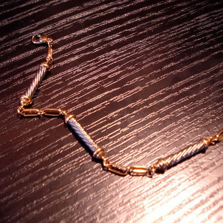 Bracelet souple câble acier et or 750