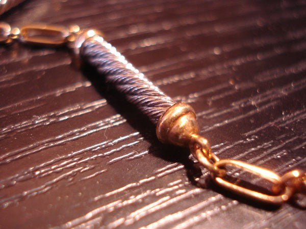 Bracelet souple câble acier et or 750