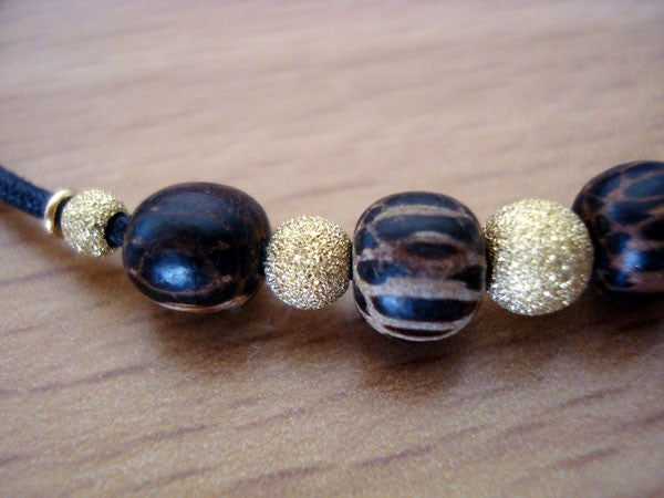 Bracelet or jaune 750 bois et coton