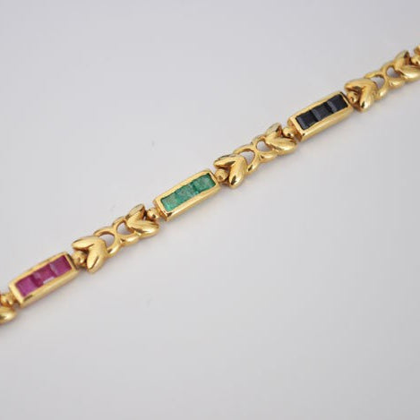 Bracelet saphirs rubis émeraudes carrés or jaune 750