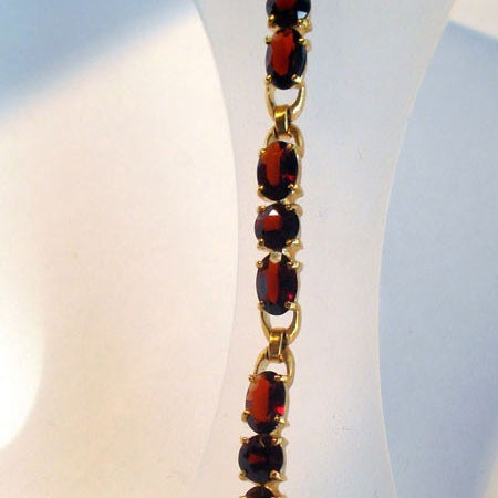 Bracelet rivière grenats or jaune 750 MM