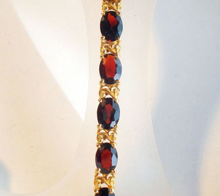 Bracelet rivière de grenats ovales or jaune 750