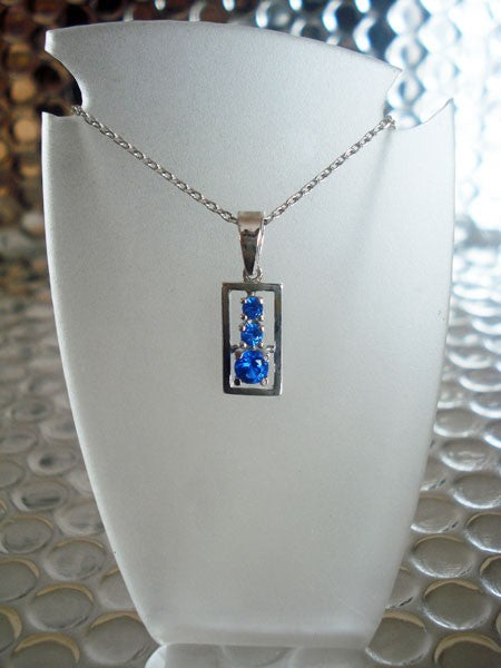 Pendentif vintage rectangle zircons bleus argent massif