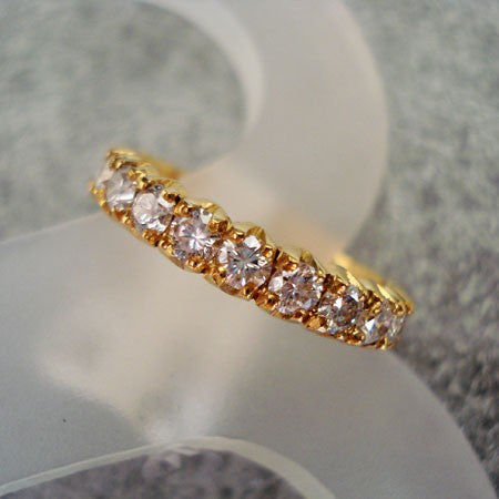 Demi-alliance 3/4 diamants griffes or jaune 750