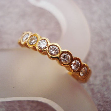 Demi-alliance serti clos diamants or jaune 750