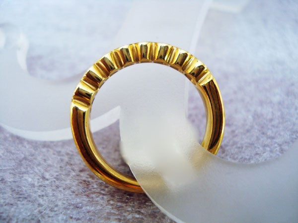 Demi-alliance serti clos diamants or jaune 750