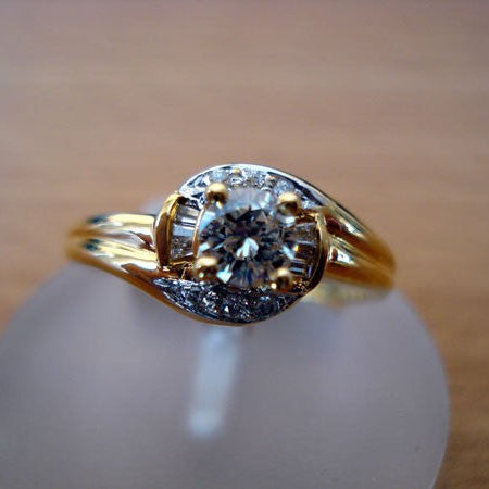 Bague solitaire diamants baguettes or jaune 750