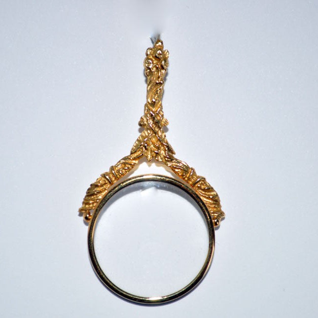 Colgante de lupa de oro amarillo de 750 milésimas