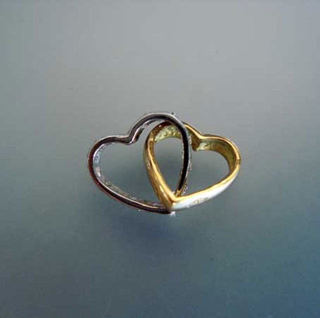 Pendentif double coeur diamants 2 ors 750