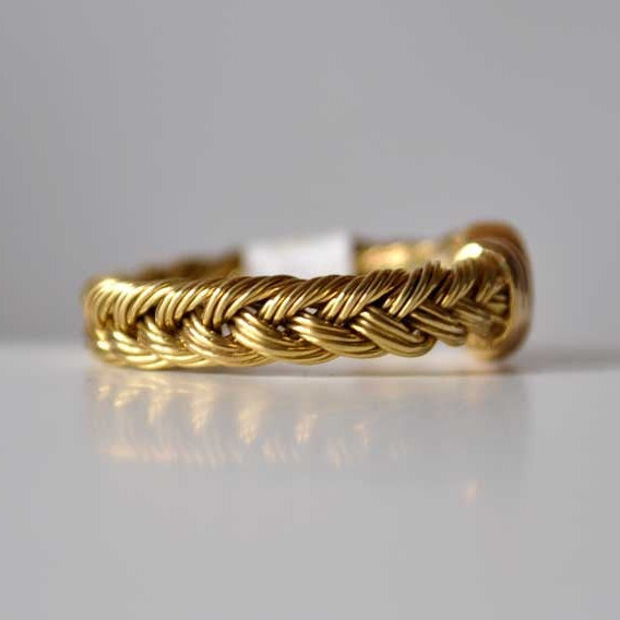 Bague tressée or jaune 750 diamant