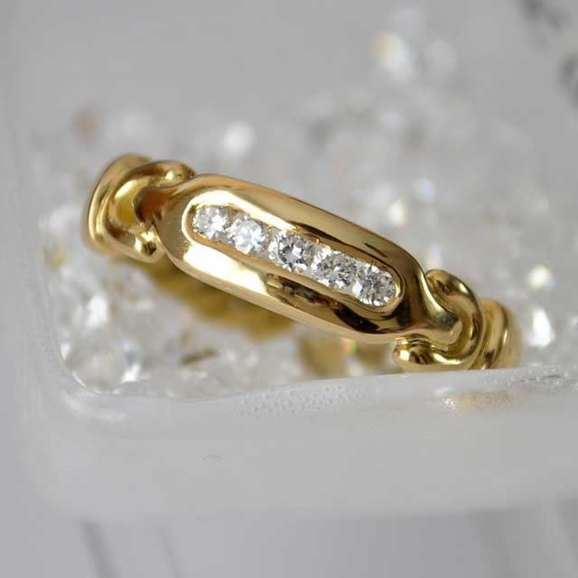 Bague diamants or jaune 750 tressée