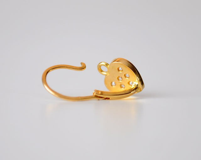 Boucles d'oreilles dormeuses coeur zirconiums or jaune 750