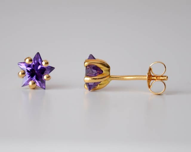 Boucles d'oreilles étoiles mauves zirconiums or jaune 750