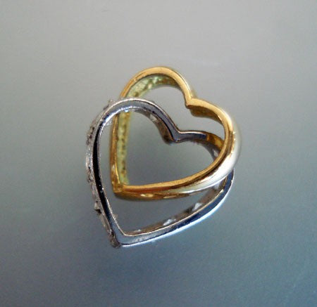 Pendentif double coeur diamants 2 ors 750