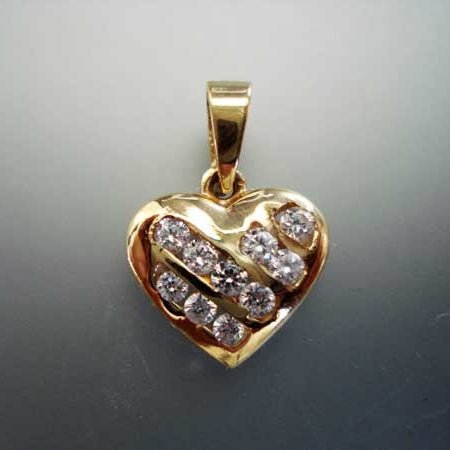 Pendentif coeur or jaune 750 zirconiums