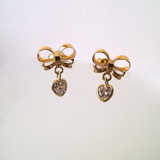 Boucles d'oreilles nœuds et cœurs zirconiums or jaune 750