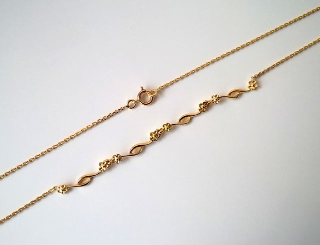 Collier fin motifs fleurs or jaune 750
