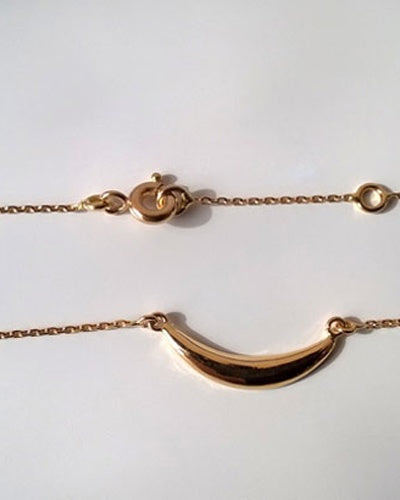 Collier fin demi-lune or jaune 750 forçat