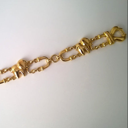 Bracelet massif éléphants or jaune 750
