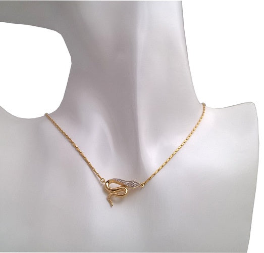 Collier serpent zirconiums or jaune 750 40 cm