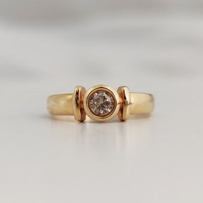 Solitaire diamant serti clos or jaune 750