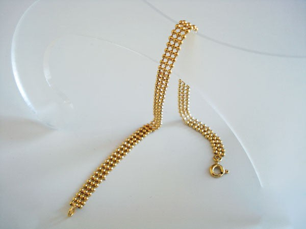 Bracelet 3 rangs boules or jaune 750