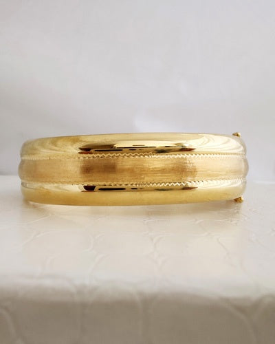 Bracelet jonc ouvrant ciselé or jaune 750 16 mm