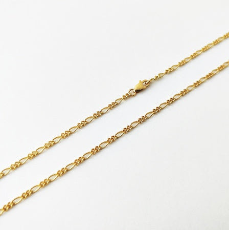 Chaine figaro diamantée or jaune 750