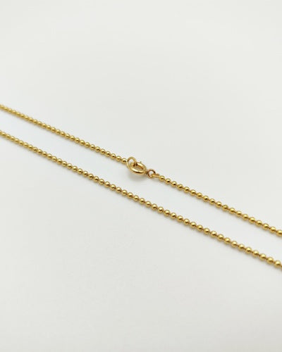 Chaine boules or jaune 750