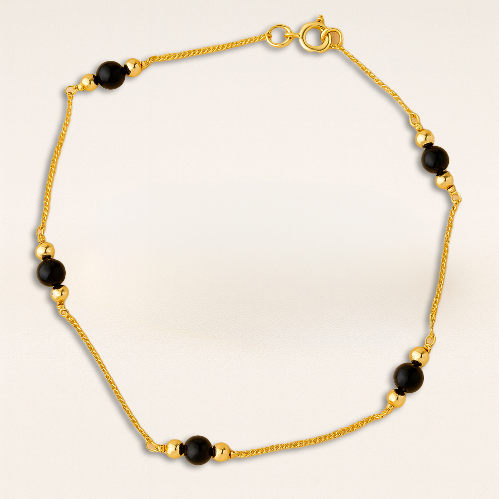 Bracelet fin gourmette boules onyx or jaune 750