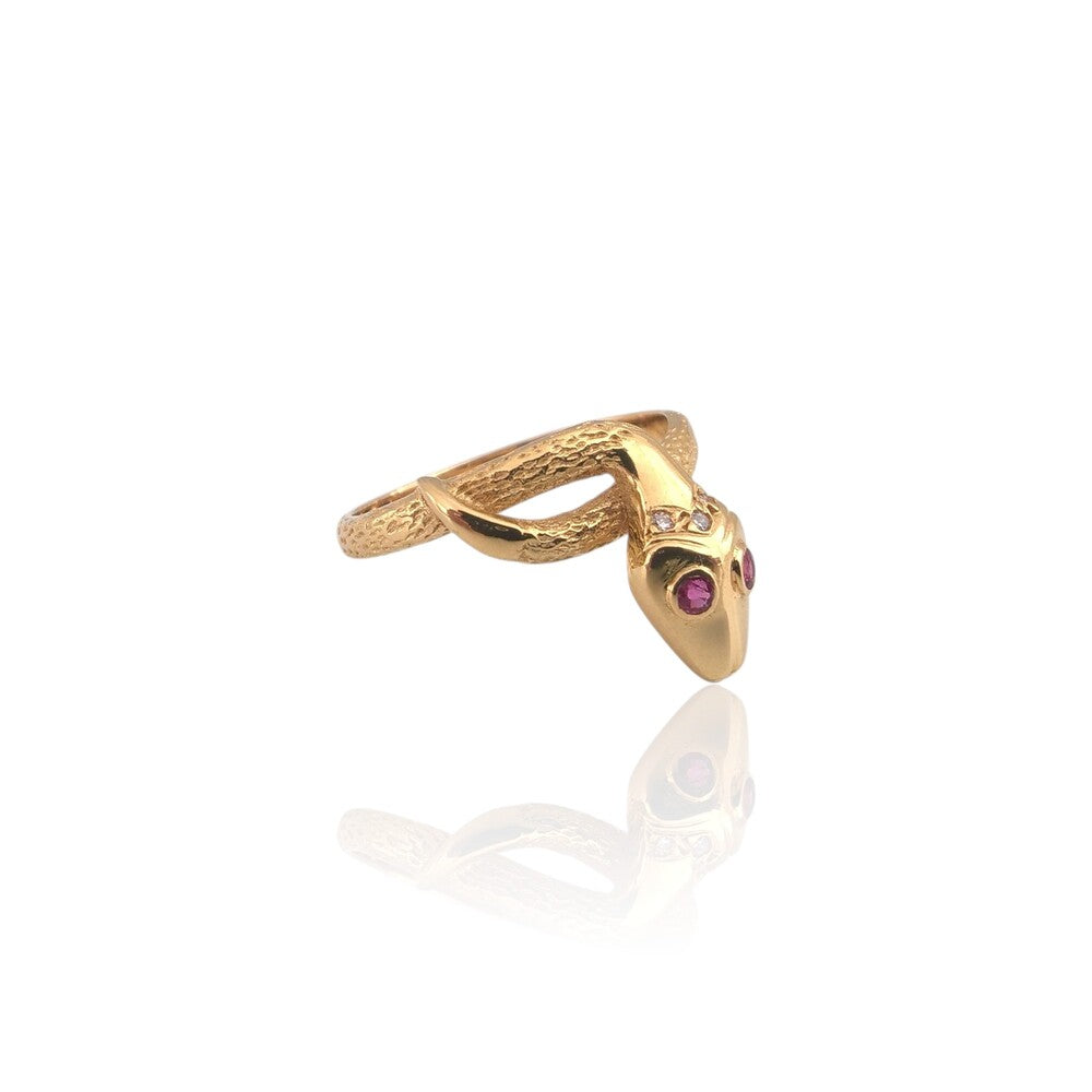 Bague tête serpent rubis anneau ciselé or jaune 750