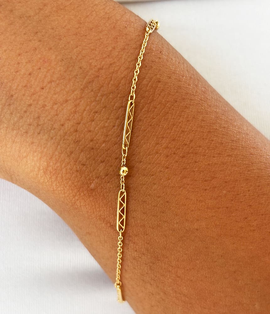 Bracelet filigrane et boules or jaune 750