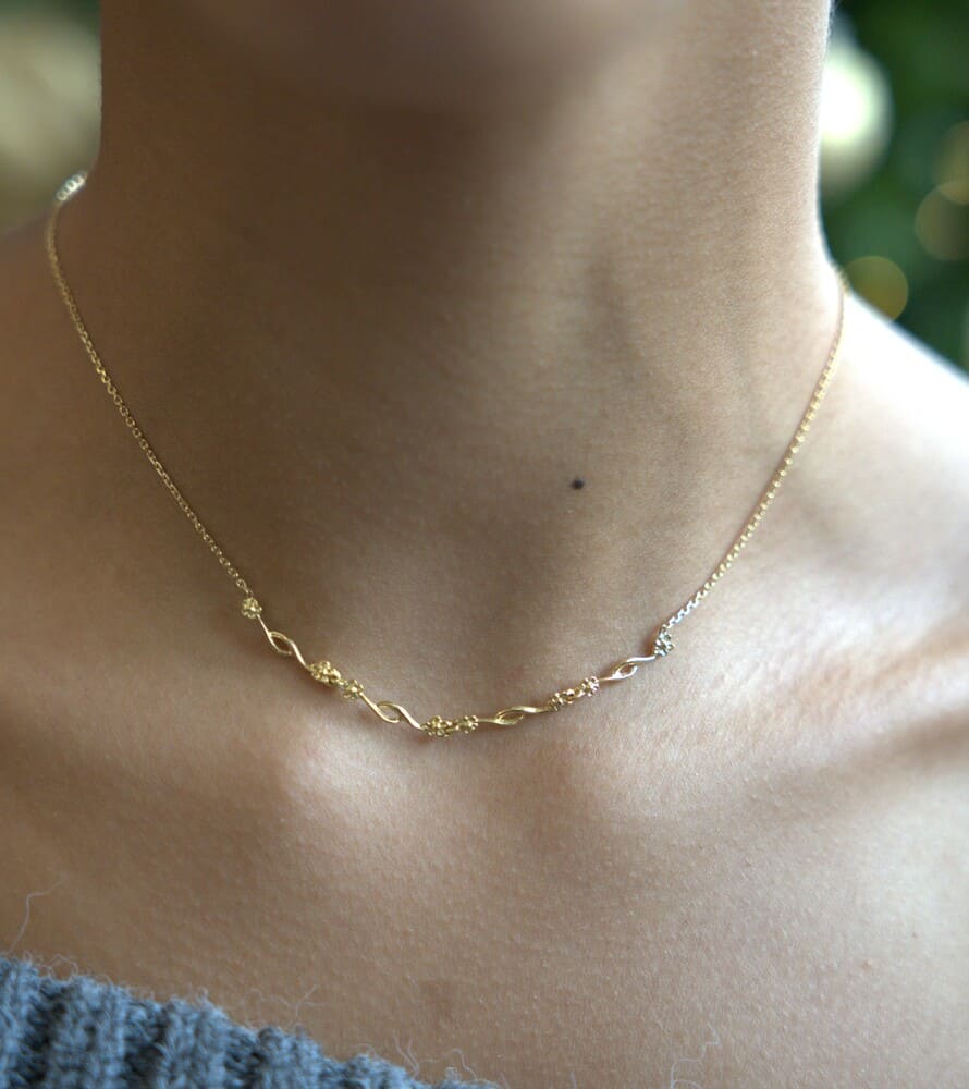 Collier fin motifs fleurs or jaune 750