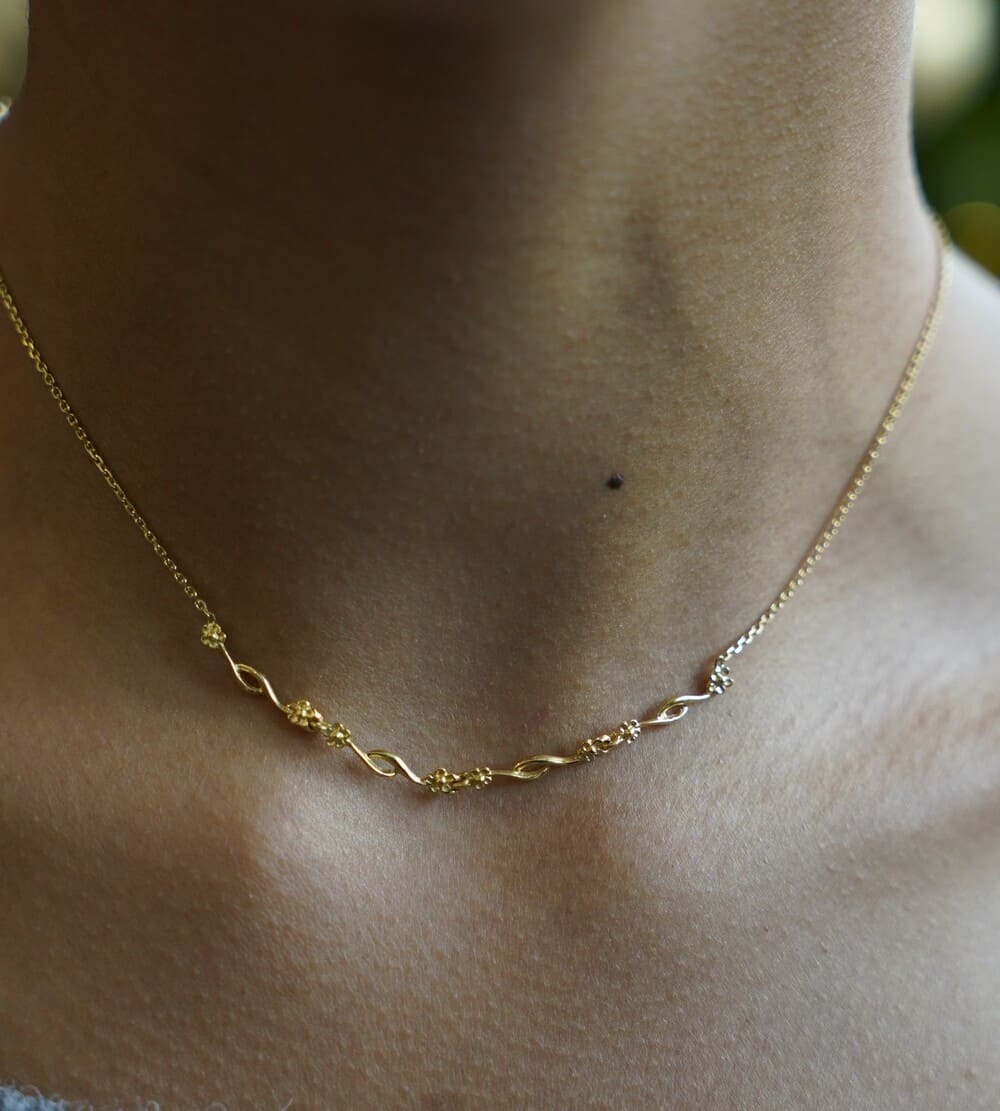 Collier fin motifs fleurs or jaune 750