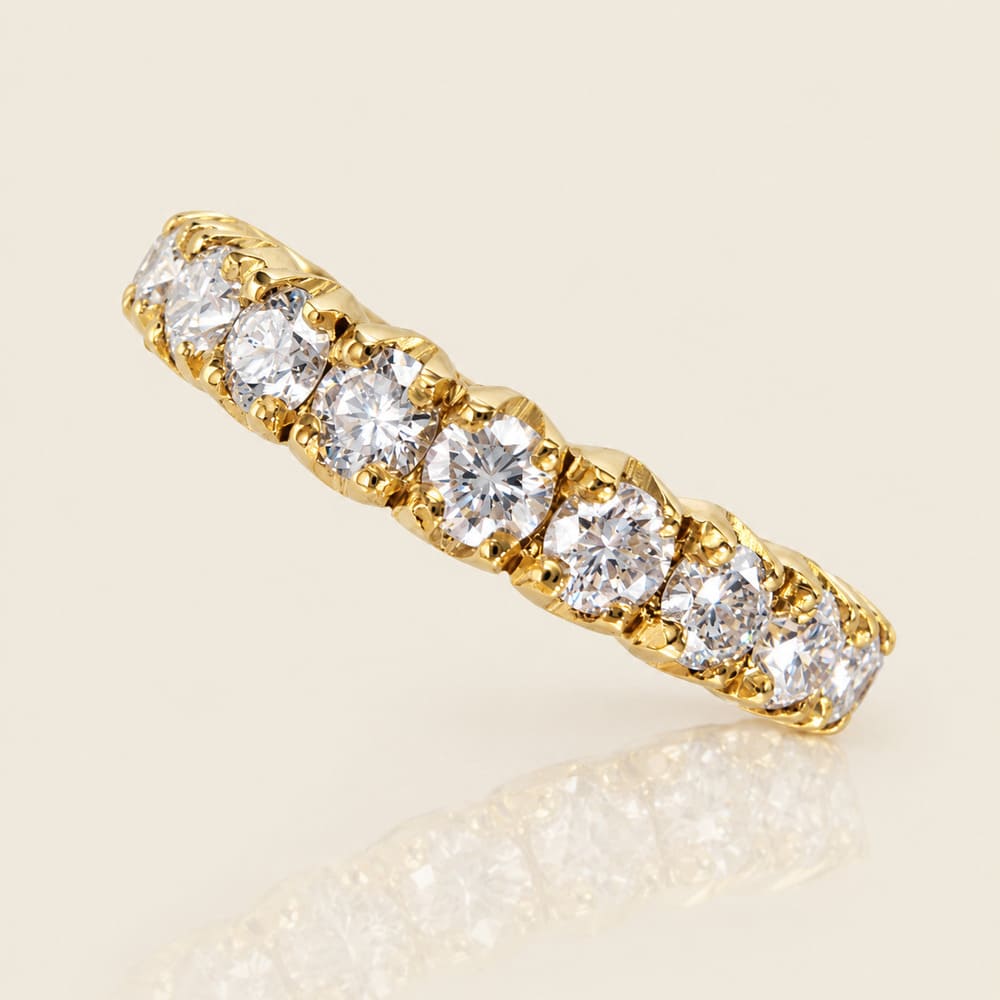 Half-eternity ring with 3/4 diamonds, claw setting, 18k yellow gold
